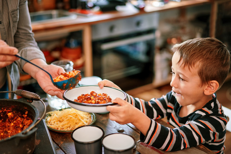 Young Family Eating Chili