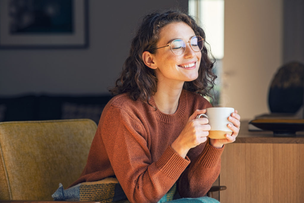 woman relaxing drinking a cup of tea